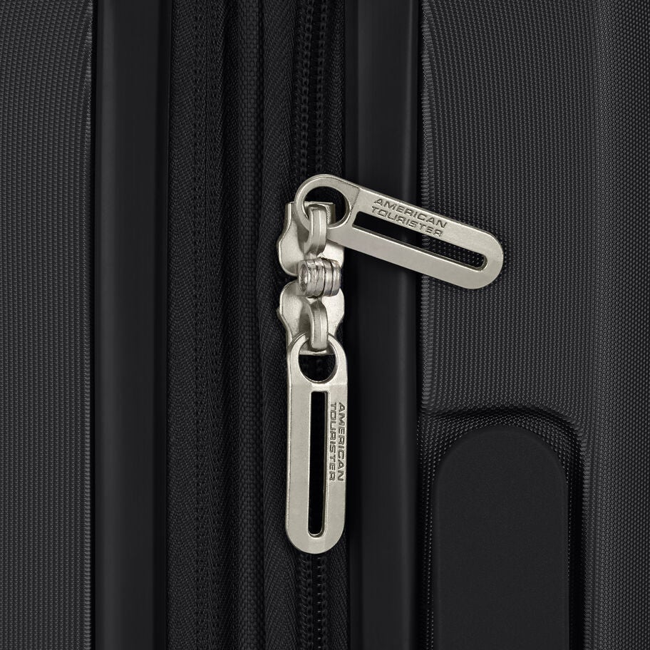 Zippered lock and hardware close-up on suitcase