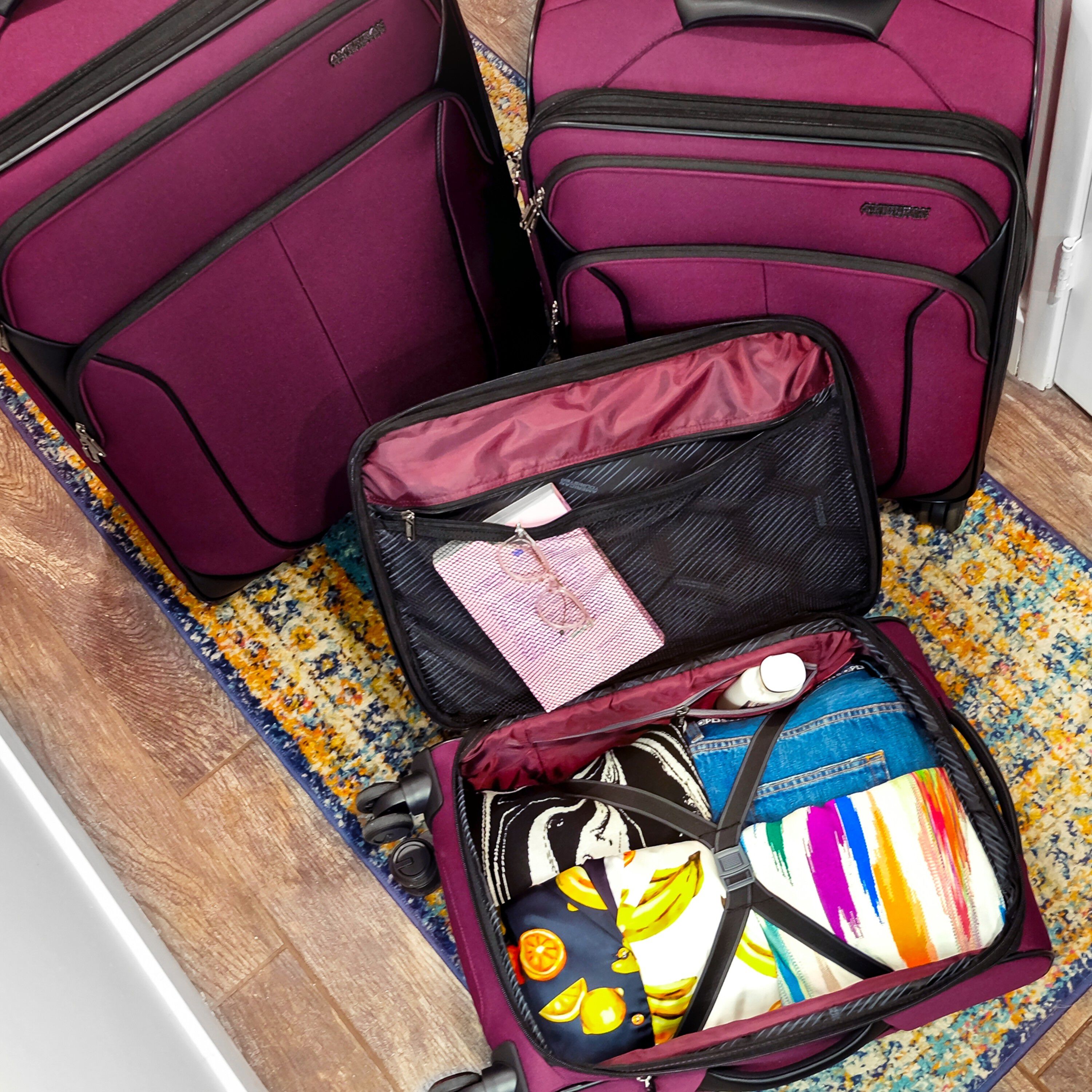 4 Kix 2.0 Medium Checked Spinner | Softside Luggage | American