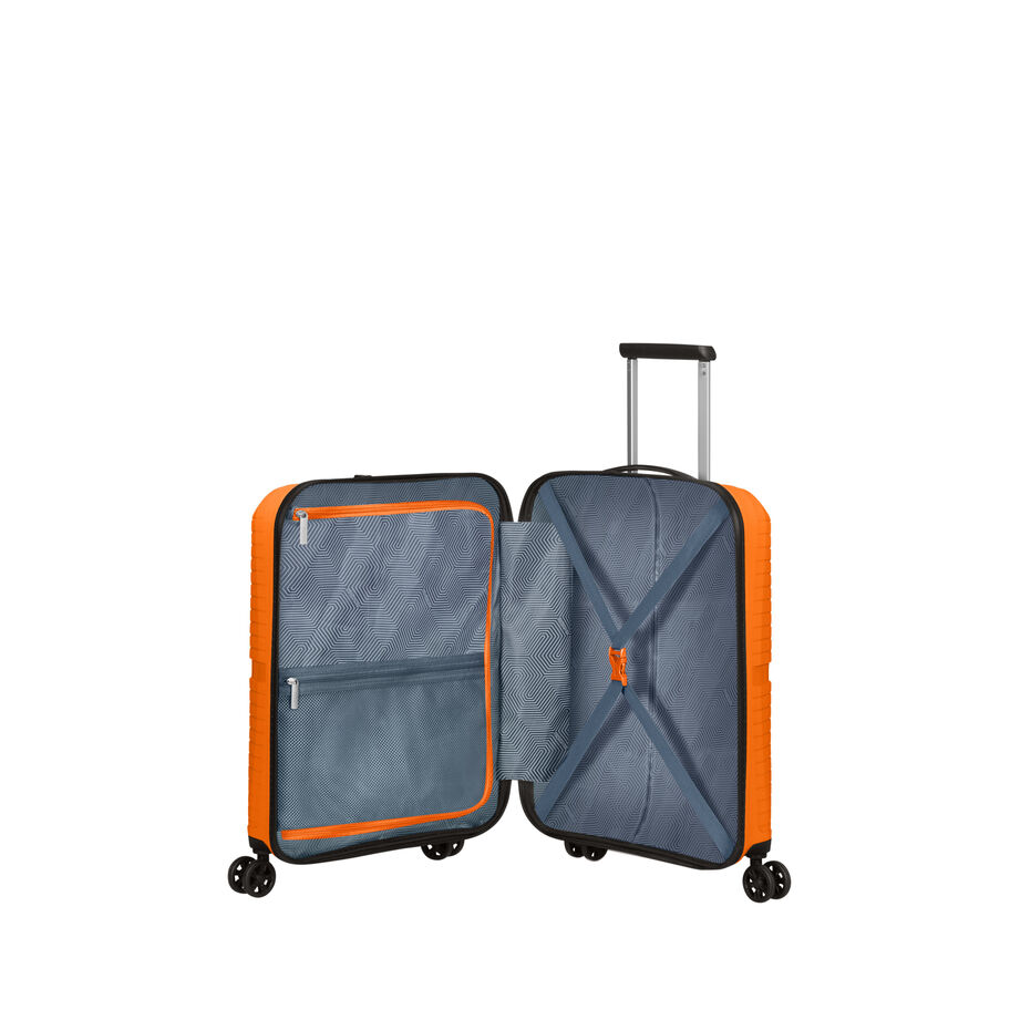 Open orange carry-on suitcase showing interior compartments and organization
